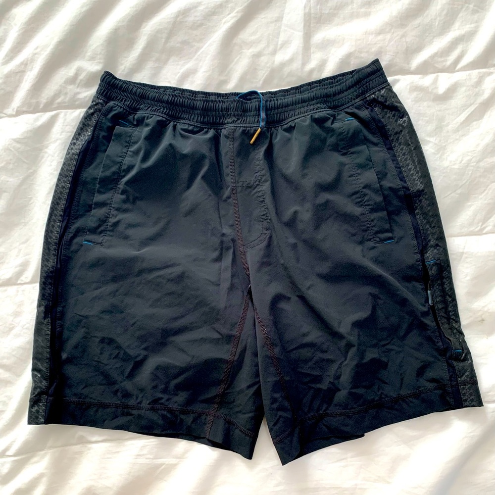 Lululemon Pace Breaker w/Unique Design black, blue, and textured on the sides